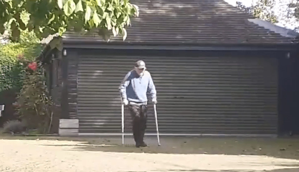 Sir David Jason limped down his driveway using crutches