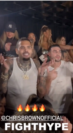 Tommy, 24, was filmed dancing alongside rapper Chris Brown and interacting with an unknown female