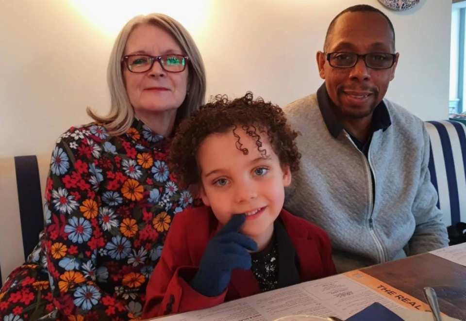 Robert with his wife Anne and their grandson Elias