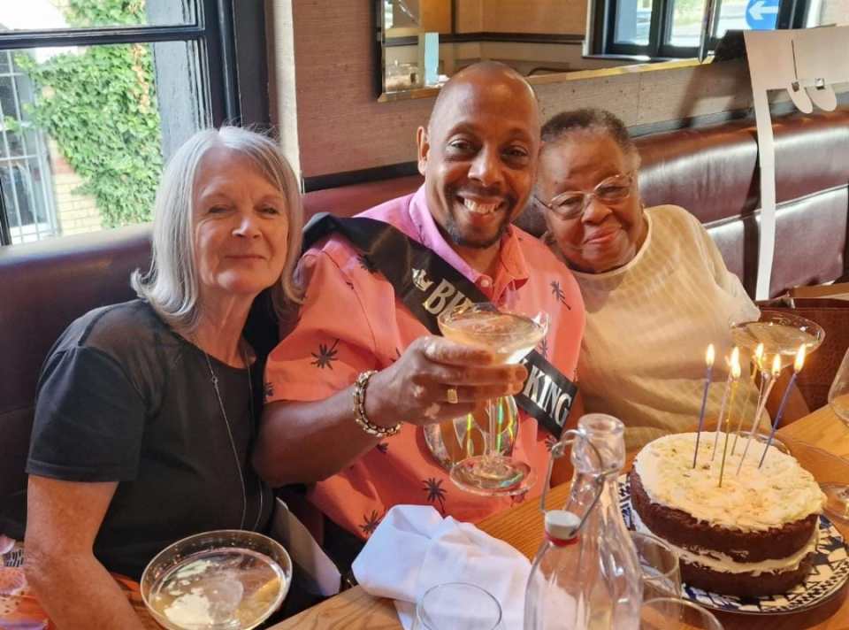 Robert celebrating his 60th birthday with his family