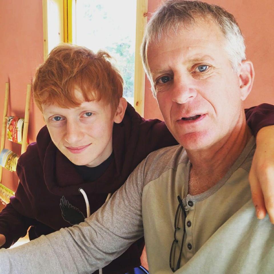 Yotam pictured with his father Raviv who tried to calm his son during the terrifying Hamas raid