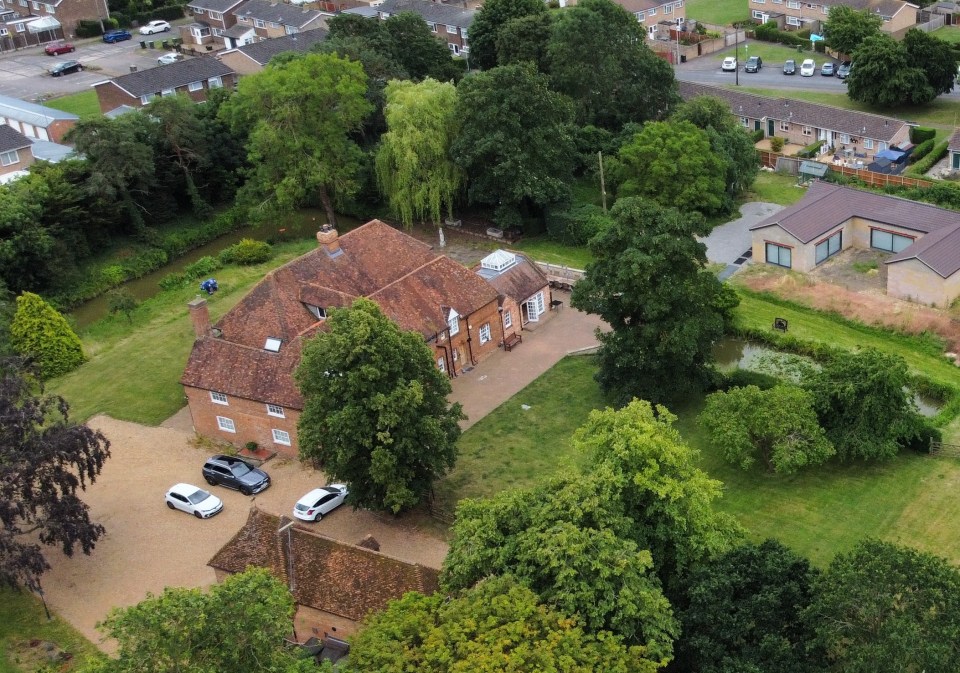 The Ingram-Moores have been told they must demolish the 'unauthorised' spa building  (top right)