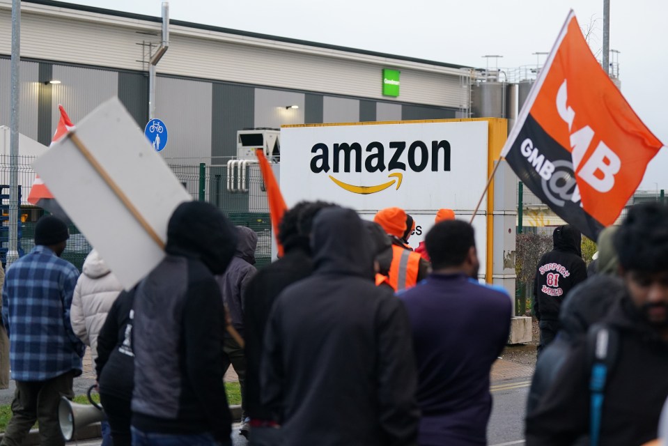 Amazon staff members on a GMB union picket line outside the online retailer’s site in Coventry