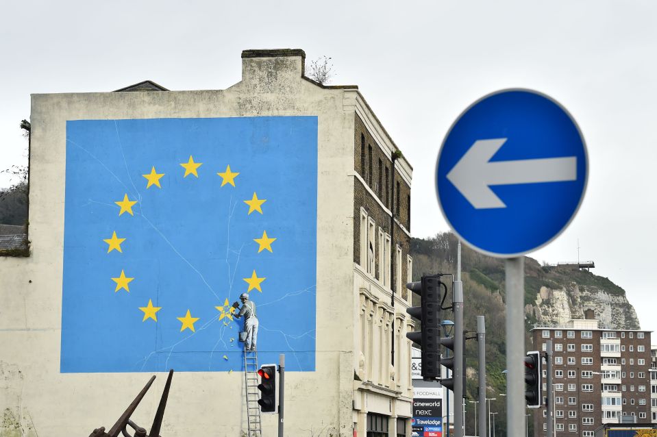 The Banksy EU mural has been knocked down along with the building it was on