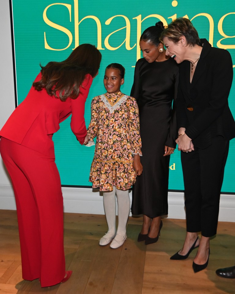 And smiled from ear to ear as she met Kate Middleton