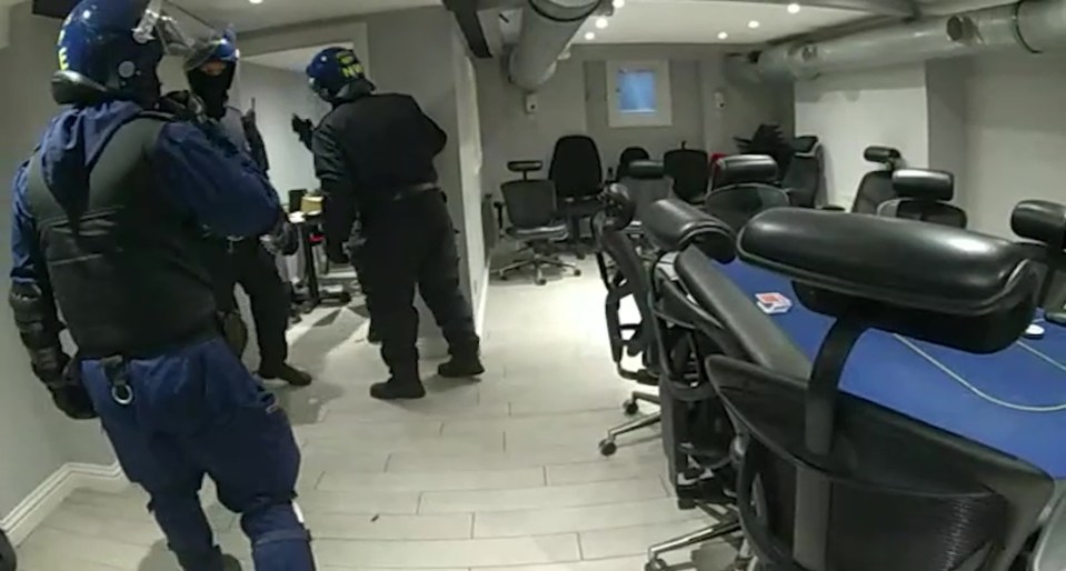 Cops bust an illegal casino as the barber shop is raided