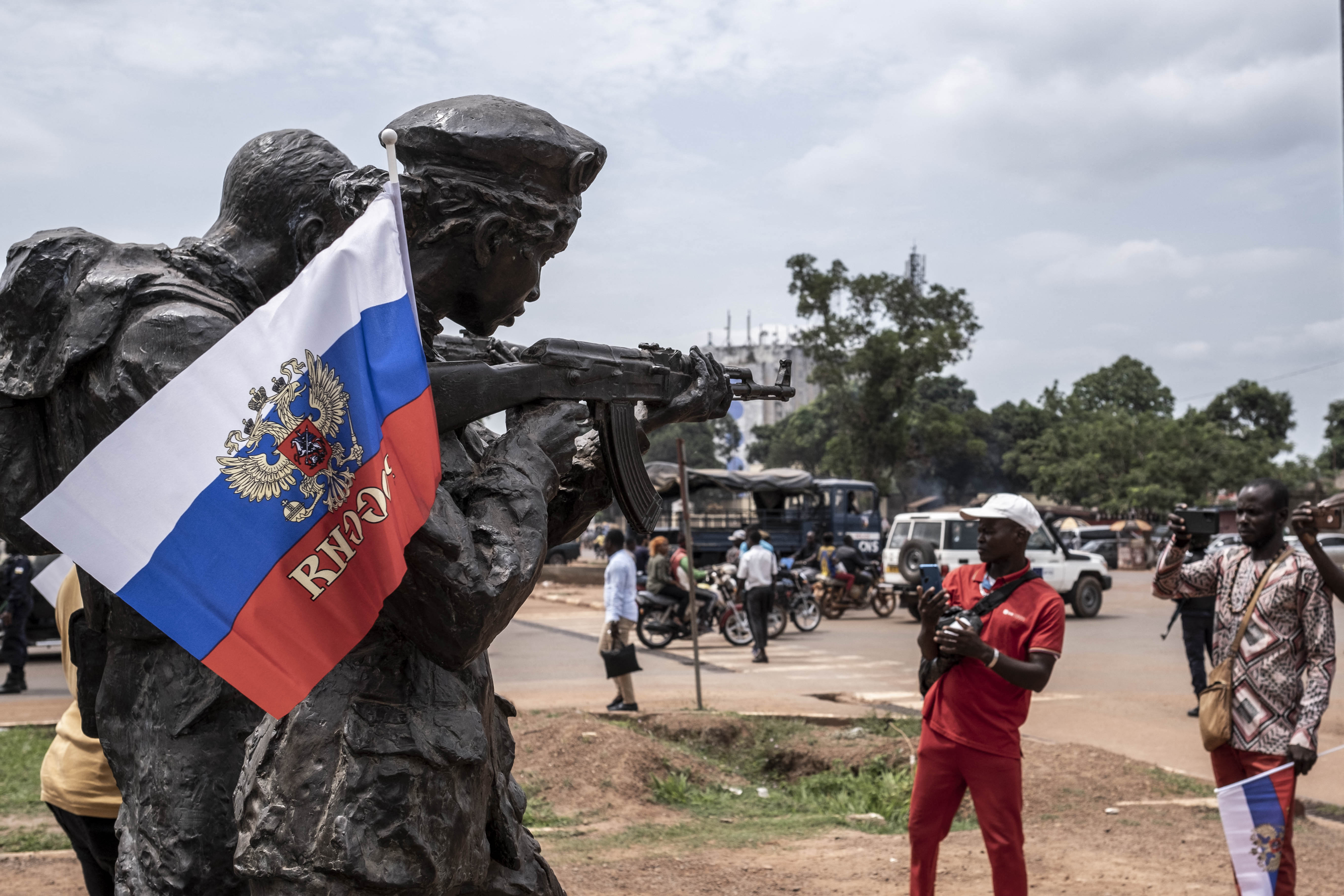 A Russian flag hangs on a monument to fallen Wagner soldiers in CAR