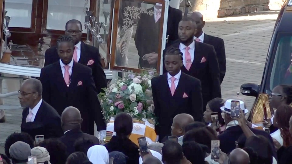 Mourners wore pink as they lay the teen to rest