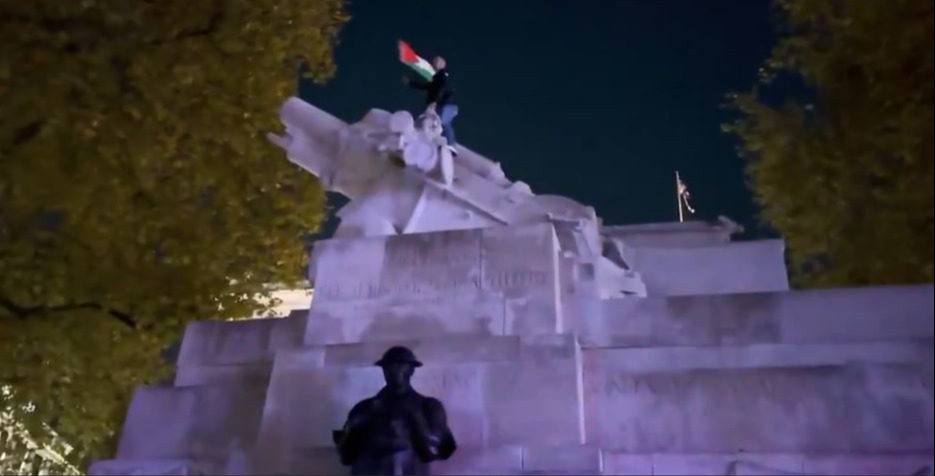 A pro-Palestine protester was seen on top of the Royal Artillery Memorial at Hyde Park Corner