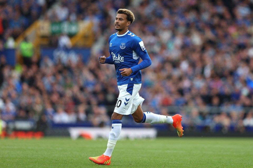 a soccer player in a blue shirt with the number 10 on it