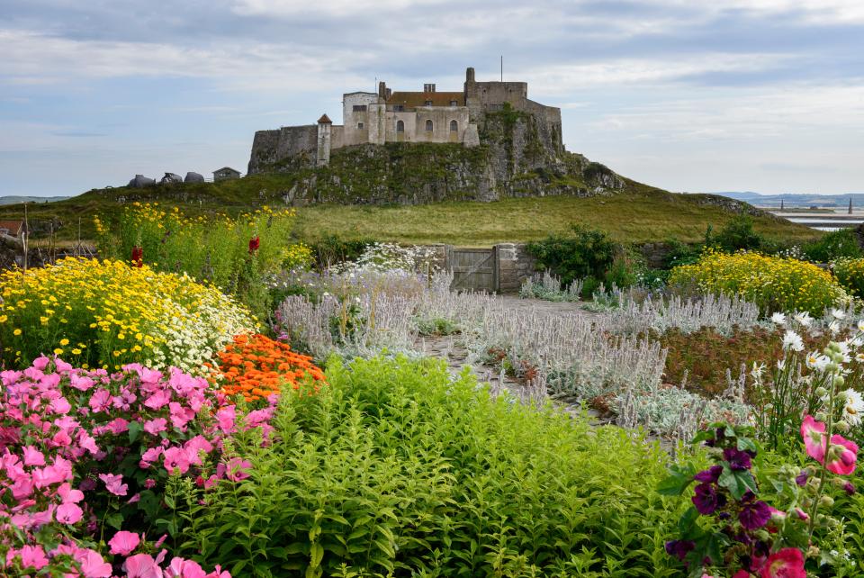 The castle's walled garden is described as a riot of colour and fragrance" in the summer.