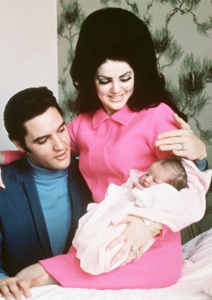 Elvis and Priscilla prepare to leave the hospital with daughter Lisa-Marie in 1968