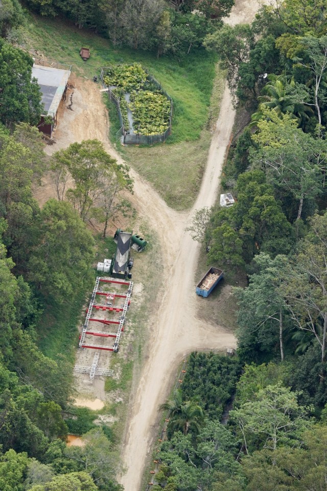 A runway has been erected on the side of a dirt track