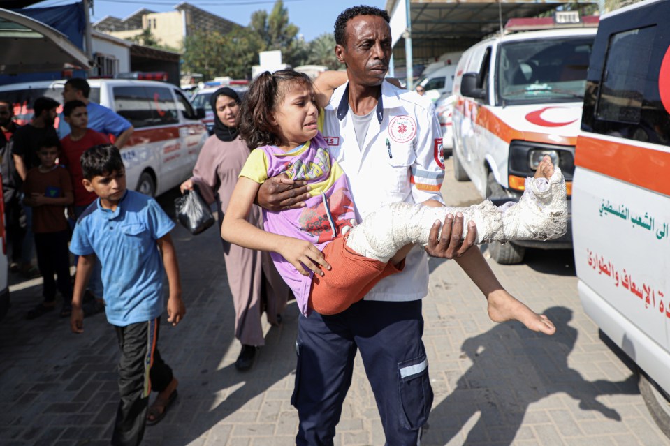 (231101) -- GAZA, Nov. 1, 2023 (Xinhua) -- A medical worker transfers a wounded girl in the southern Gaza Strip city of Rafah, Nov. 1, 2023. Egypt received on Wednesday wounded Palestinians from the besieged Gaza Strip via the Rafah crossing, the only linking point between Egypt and the enclave, according to a security source. (Photo by Rizek Abdeljawad/Xinhua) Xinhua News Agency / eyevine Contact eyevine for more information about using this image: T: +44 (0) 20 8709 8709 E: info@eyevine.com //www.eyevine.com