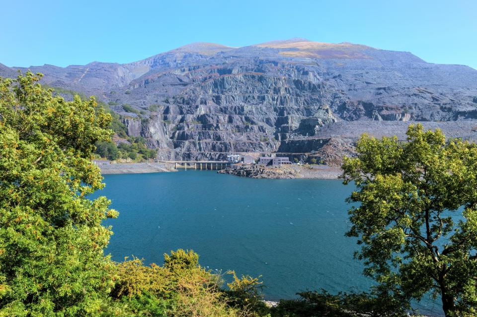 The quarry is near to a lake overlooked by a 13th century castle