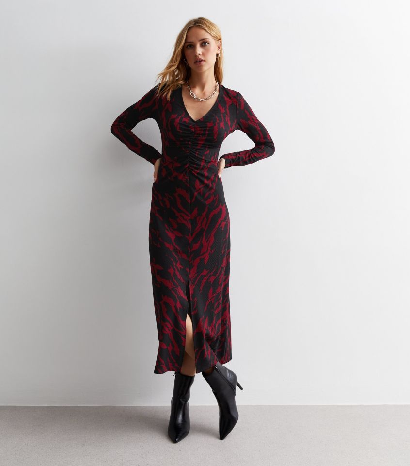 This dress from New Look will flatter all figures with a V-neck, midi length and stomach ruching