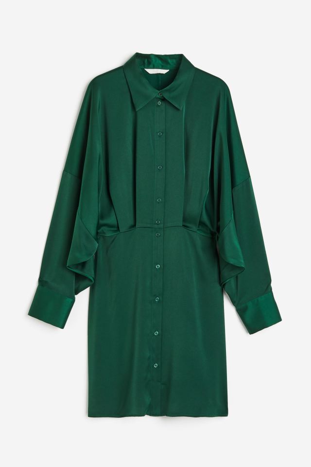 This dress in rich forest green can be worn for work or play.