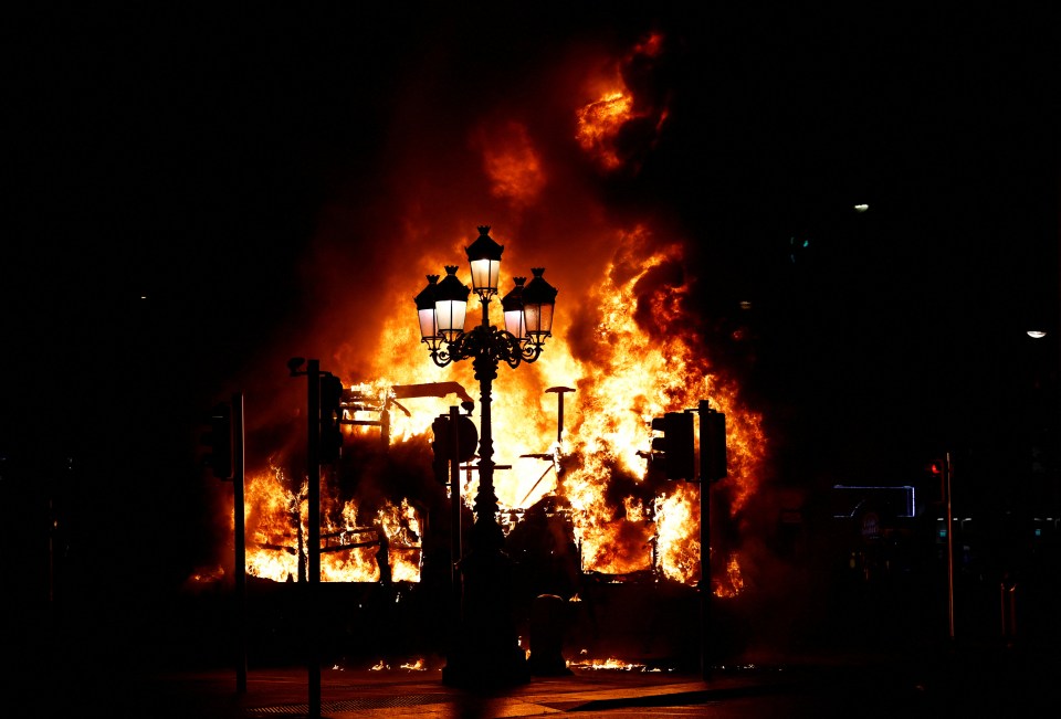 The moment a double decker bus was set alight