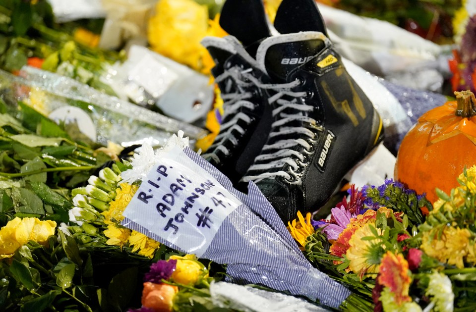 A pair of skates lie among floral tributes outside the Motorpoint Arena in Nottingham