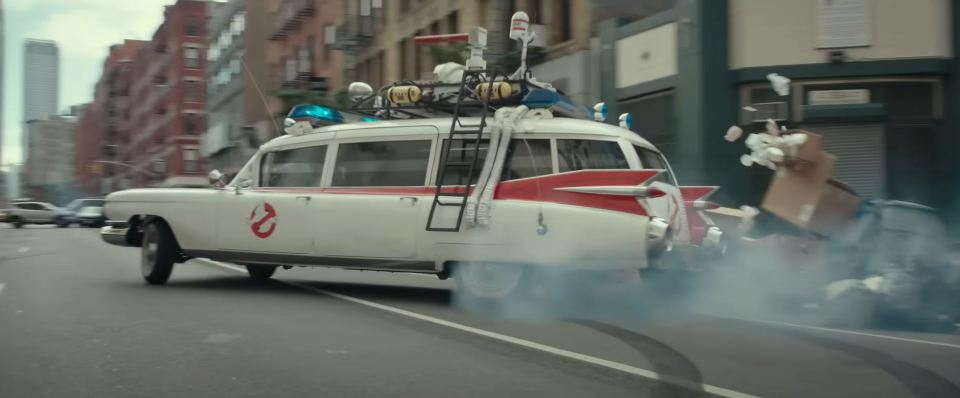 The Ghostbusters jump into their Ectomobile on the hunt troublesome ghouls