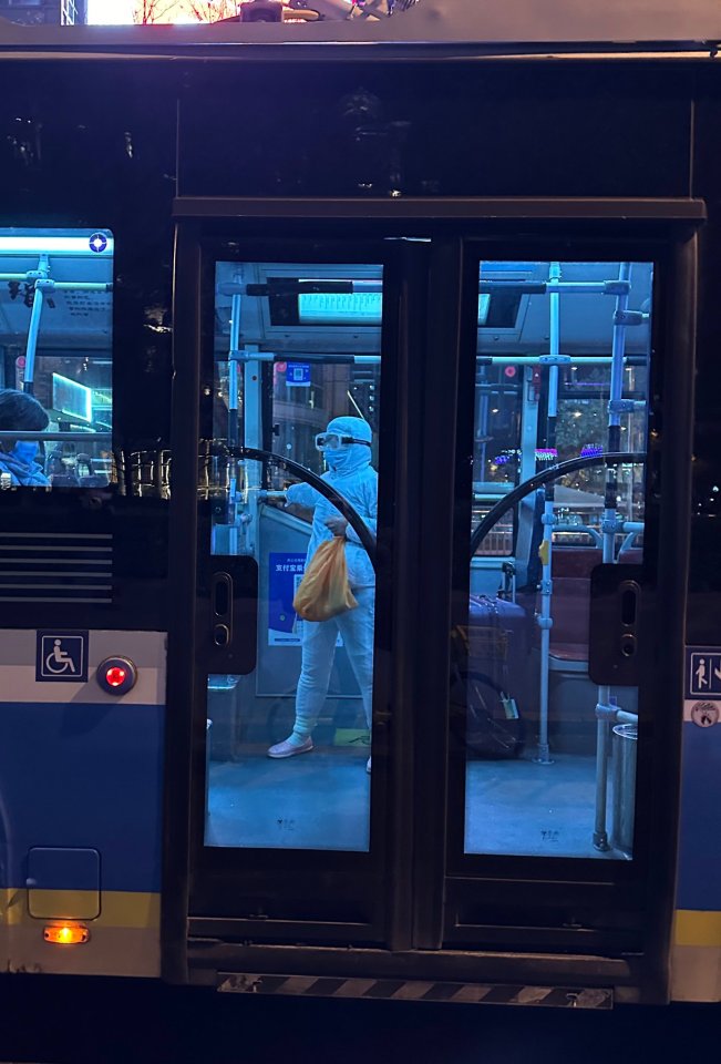 Chinese citizens are already taking extra precaution this year, with one commuter spotted wearing a full protective suit while riding a bus this week