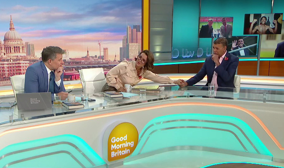 GMB anchor Susanna, 52, held Chris' hand across the desk to reassure him