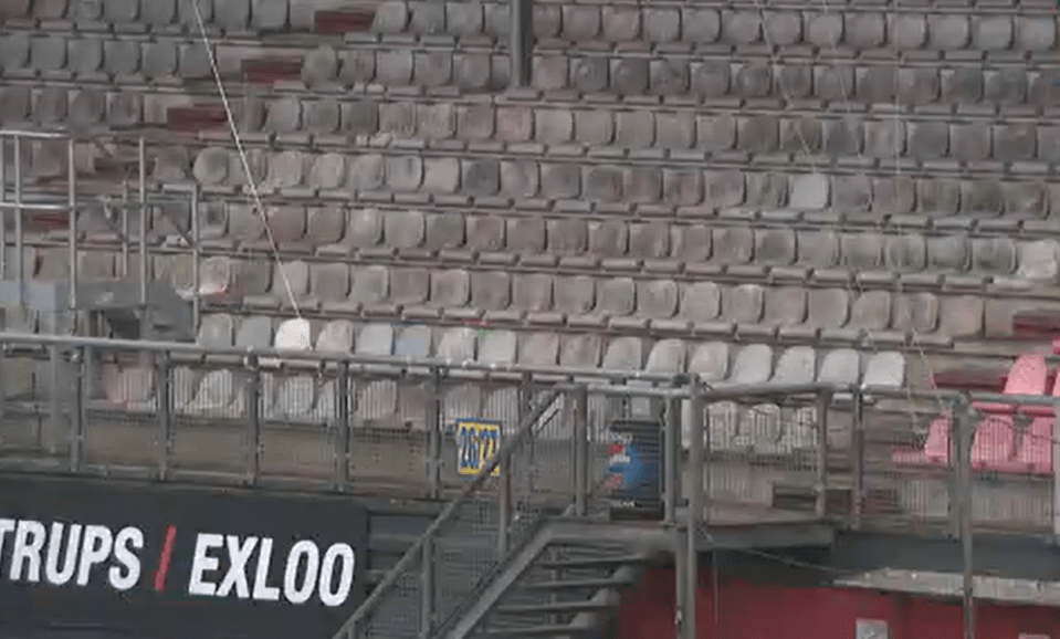 Rows of seats have been left blackened with dust and grime