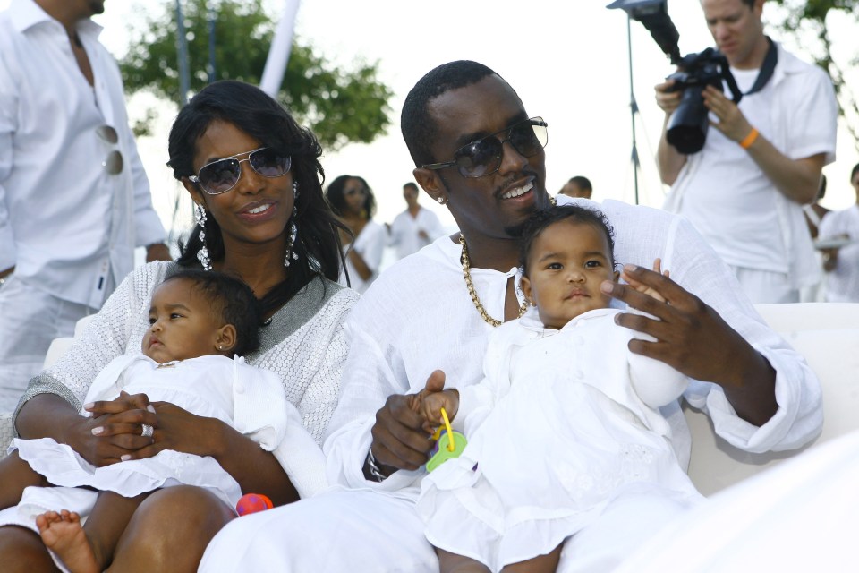 Sean 'Diddy' Combs and Kim Porter with their twin daughter