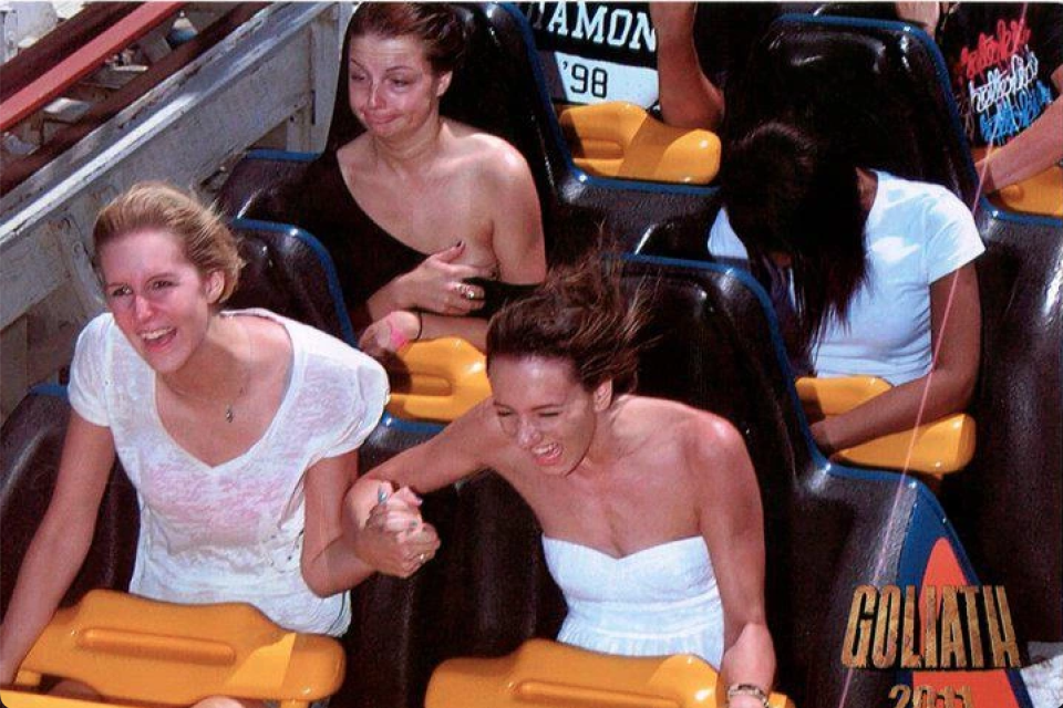 A woman was left red faced when she accidentally flashed everyone on a rollercoaster