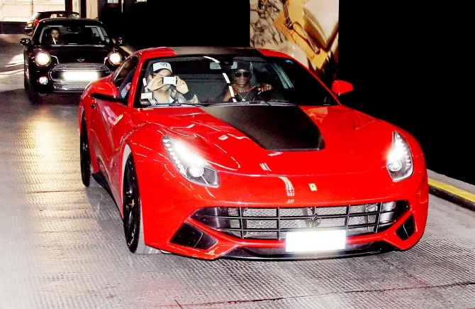 The 33-year was spotted driving this red Ferrari in 2014