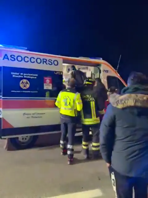 Balotelli climbs into the ambulance to be checked out