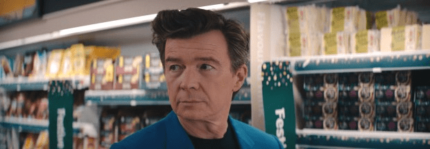 Iconic 80s star Rick Astley has a cameo in the clip