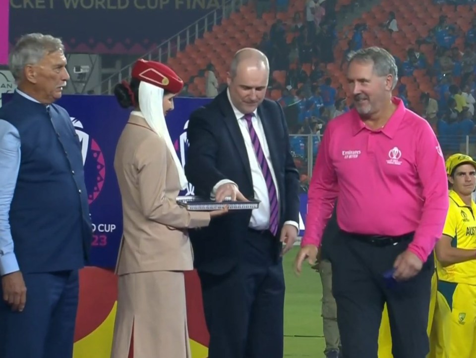 The umpires were booed by fans as they received their medals