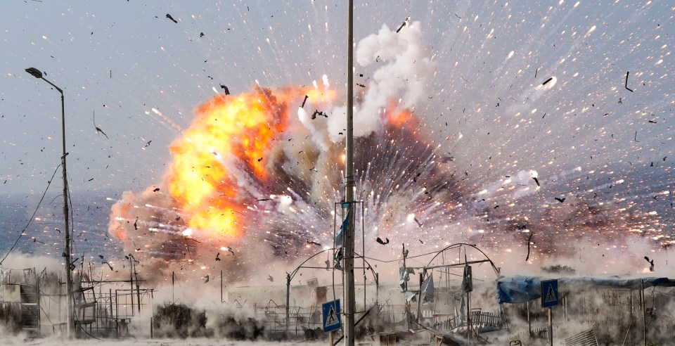 The arms dump is blown up and destroyed by the IDF