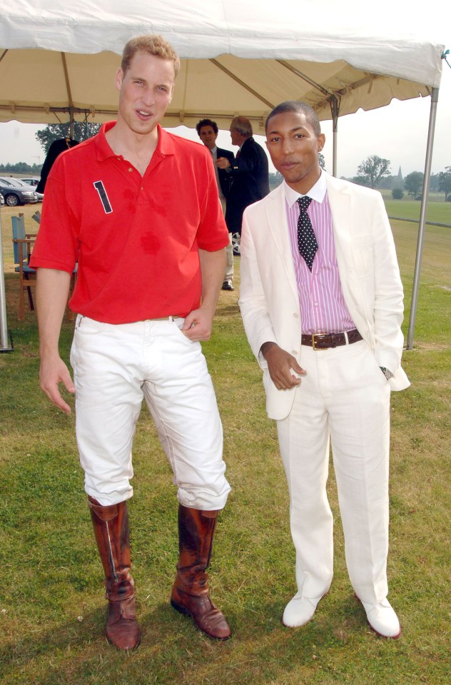 Prince William, pictured with Pharrell Williams, enjoys a game of polo at Cowdray park