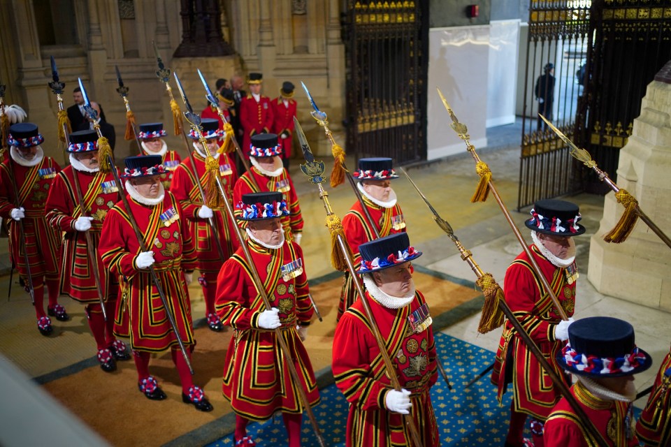 The King’s Bodyguard, the Yeomen of the Guard, arrives at the Sovereign’s Entrance to the Palace of Westminster