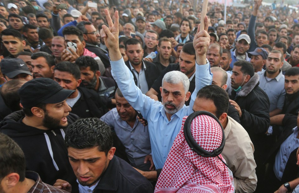 Sinwar is mobbed by supporters in Khan Yunis in 2018