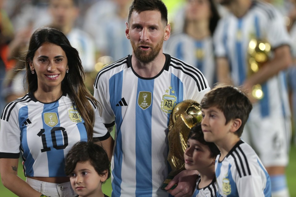 Antonella helps Lionel Messi celebrate winning the World Cup