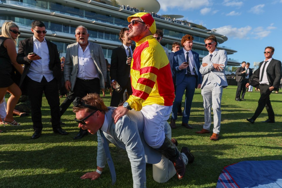 One 'jockey' rides a 'horse'