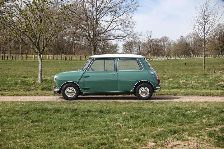 The car is almond green with a white roof and grey interior