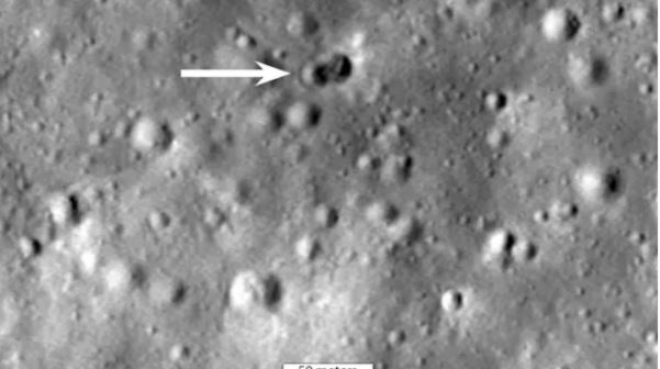 The mystery rocket part collided with the Moon in March 2022, leaving an unusual impact crater highlighted by the white arrow above