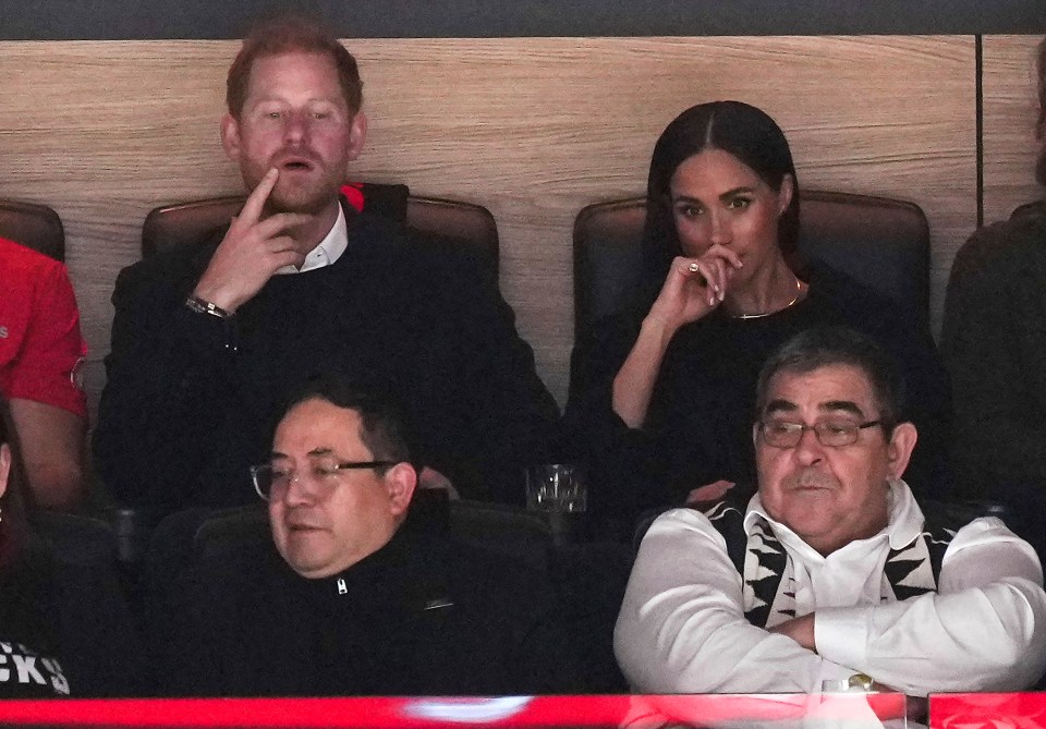 Harry watching the game in Vancouver with Meghan