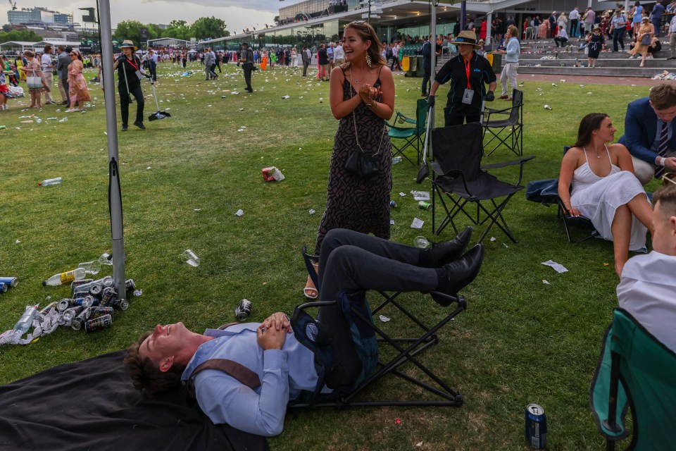 It all got a bit too much for this racegoer who looked to be falling asleep after falling back in his seat