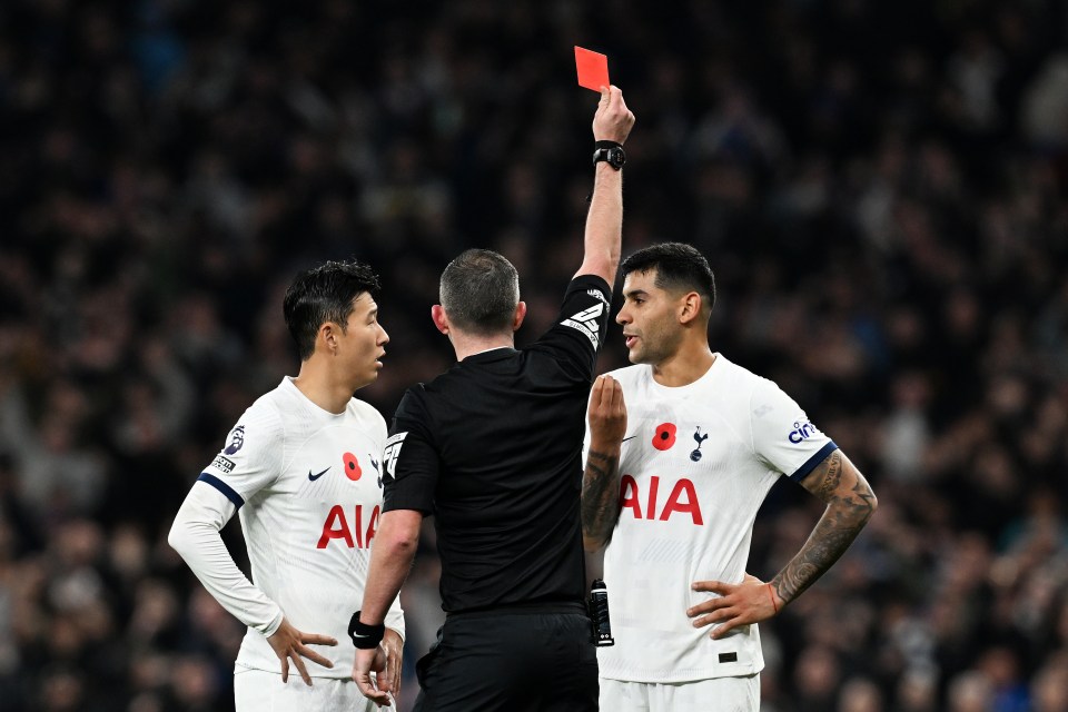 Michael Oliver sent off Cristian Romero following a lengthy VAR check