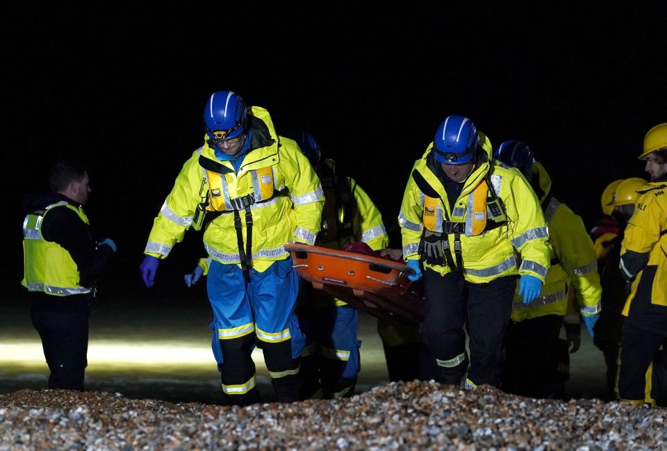 An RNLI crew rescued dozens of migrants from French waters