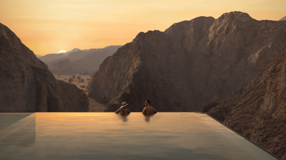 It features a luxury infinity pool with breathtaking desert views