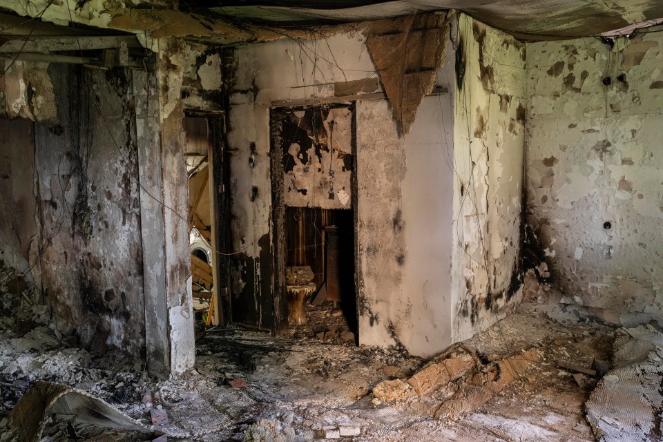 The ruined remains of a kibbutz building attacked by Hamas in the October 7 massacre