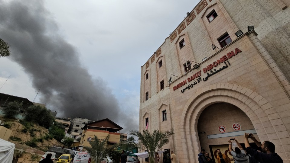 Smoke rises following an Israeli strike near the Indonesian Hospital