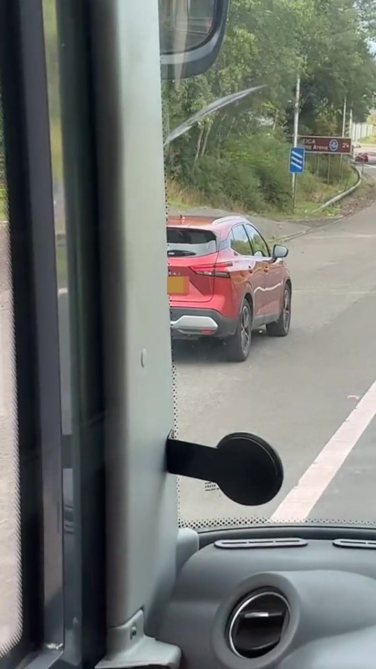 The Qashqai sped past the massive truck along the hard shoulder