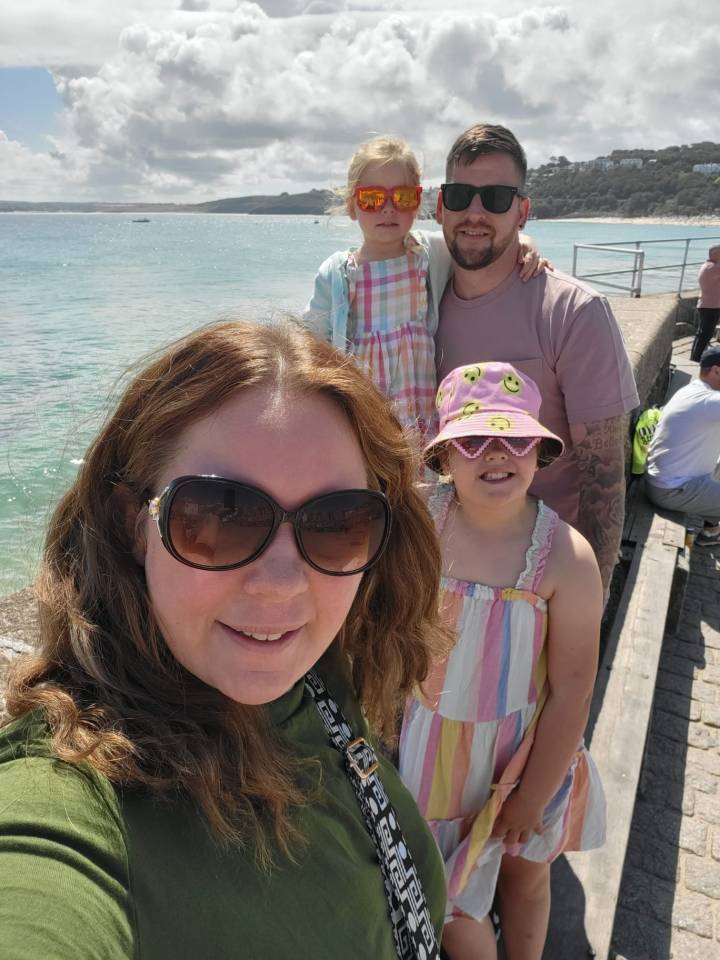 Sophie with husband Martin and kids Bella-Grace, eight, and Daisy, four